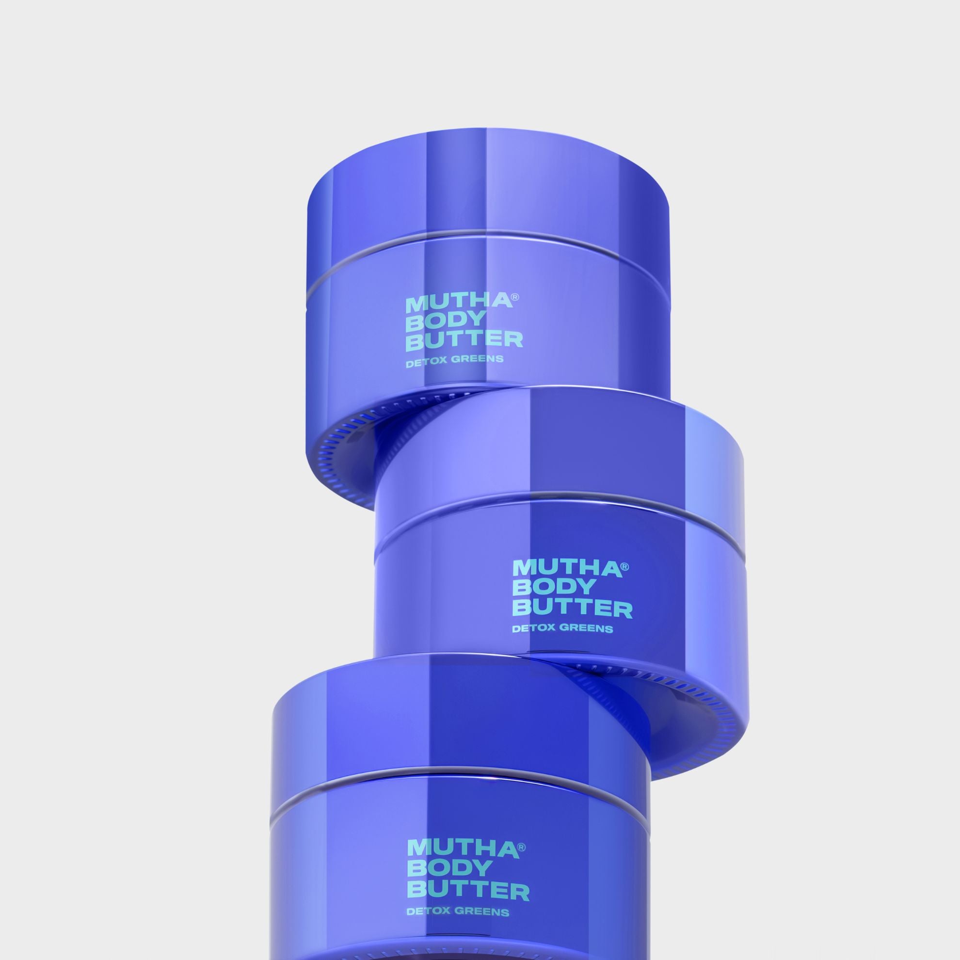 Stack of purple containers labeled 'Mutha Body Butter' on a light gray background