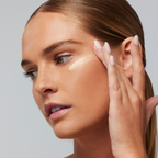 Image of a model applying a swipe of the Up All Night Eye Cream , 15ml / 0.5 fl oz , 3ml / 0.1 fl oz