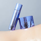 Stylish image of the Body Butter and Body Oil balancing on the back of a model