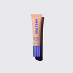 MUTHA Pucker Up Lip Plump Almond Mom tube standing upright on a light background with a purple cap.