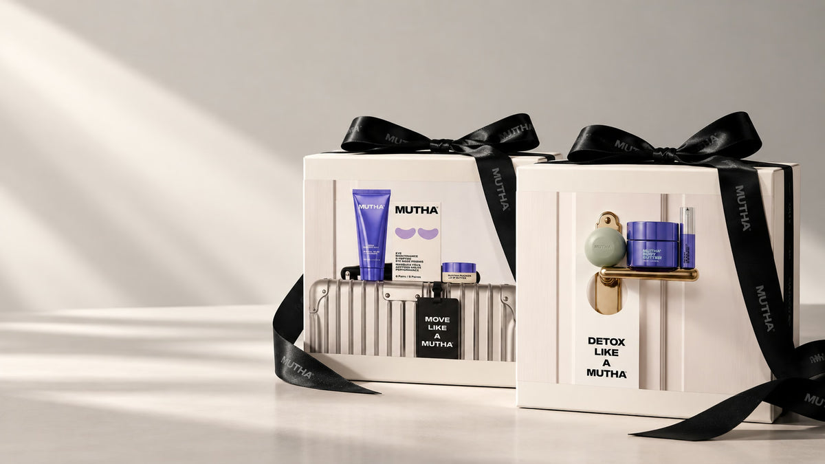 The Detox Like A MUTHA and Move Like A MUTHA holiday gift sets side by side, tied with black MUTHA ribbon