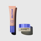 MUTHA Pucker Up Lip Plump tube and MUTHA Pucker Lip Butter jar side by side on a pale grey background, both with the signature purple cap